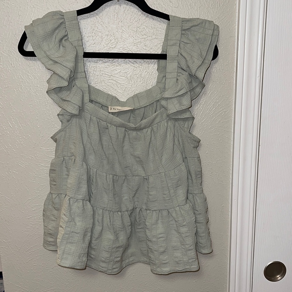 Green ruffle tank from These Three Boutique